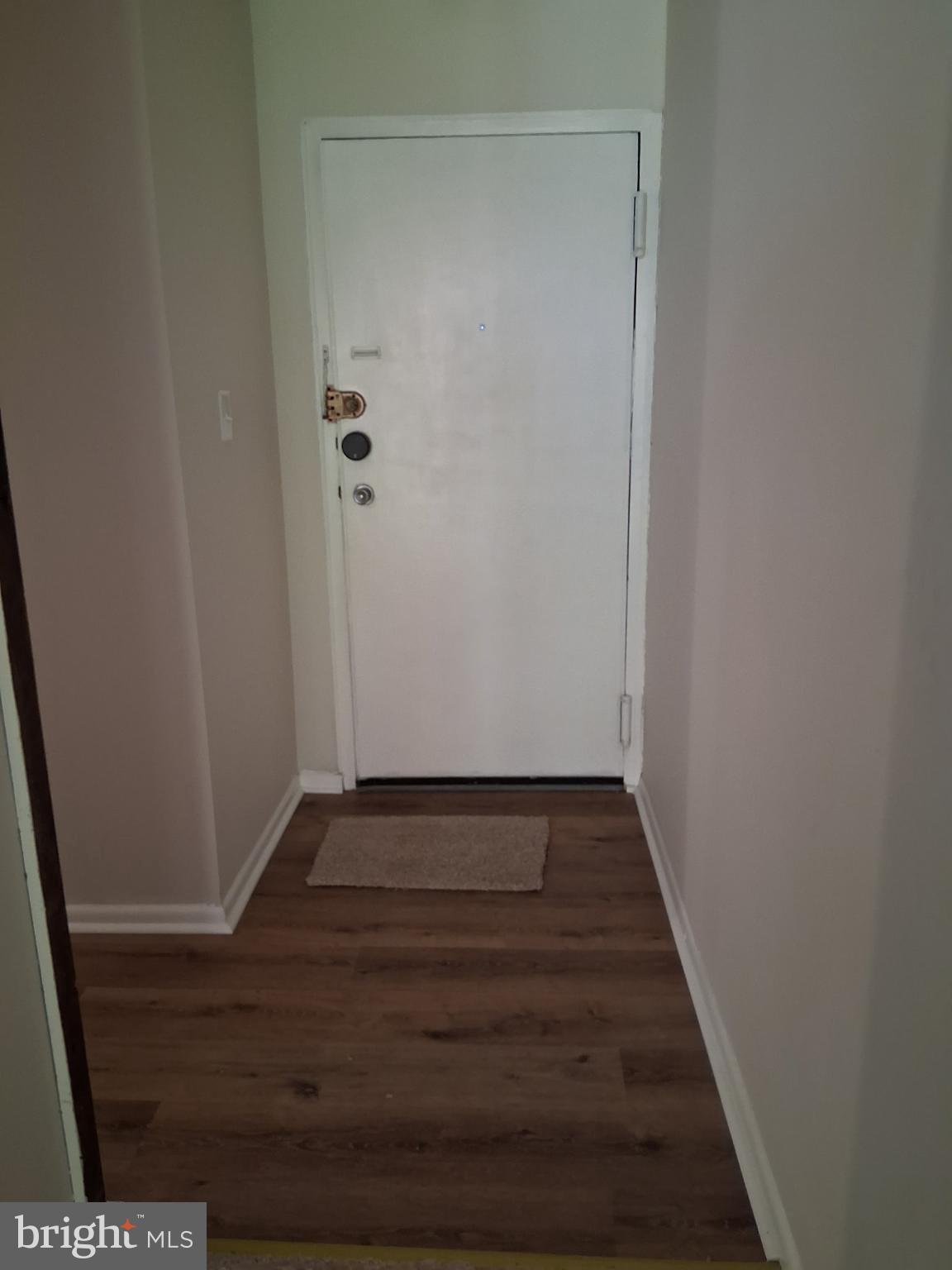 8479 Greenbelt Road, Unit 102 Greenbelt, MD 20770 - Photo 12 of 14 a view of wooden door