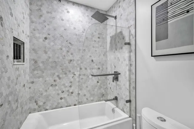 a bathroom with a bathtub