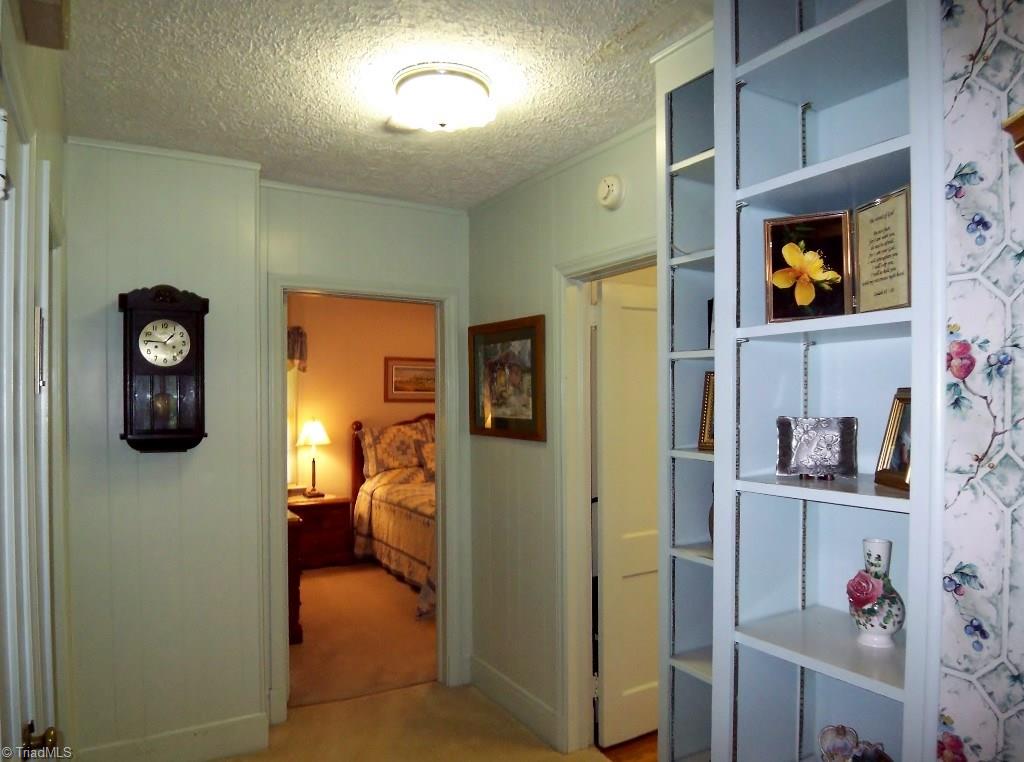 3158 Dillon Road Jamestown, NC 27282 - Photo 20 of 26 Hallway and built in shelves