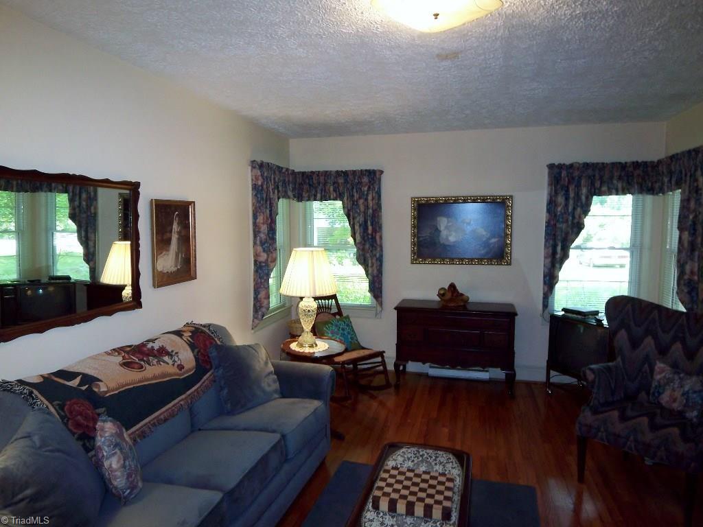 3158 Dillon Road Jamestown, NC 27282 - Photo 5 of 26 Large Living Room and Window Treatments Remain!