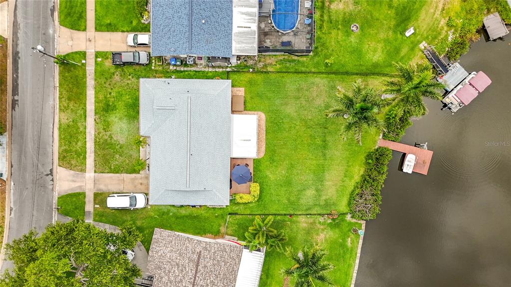 508 Shore Drive Largo, FL 33771 - Photo 28 of 31 an aerial view of a house with a garden