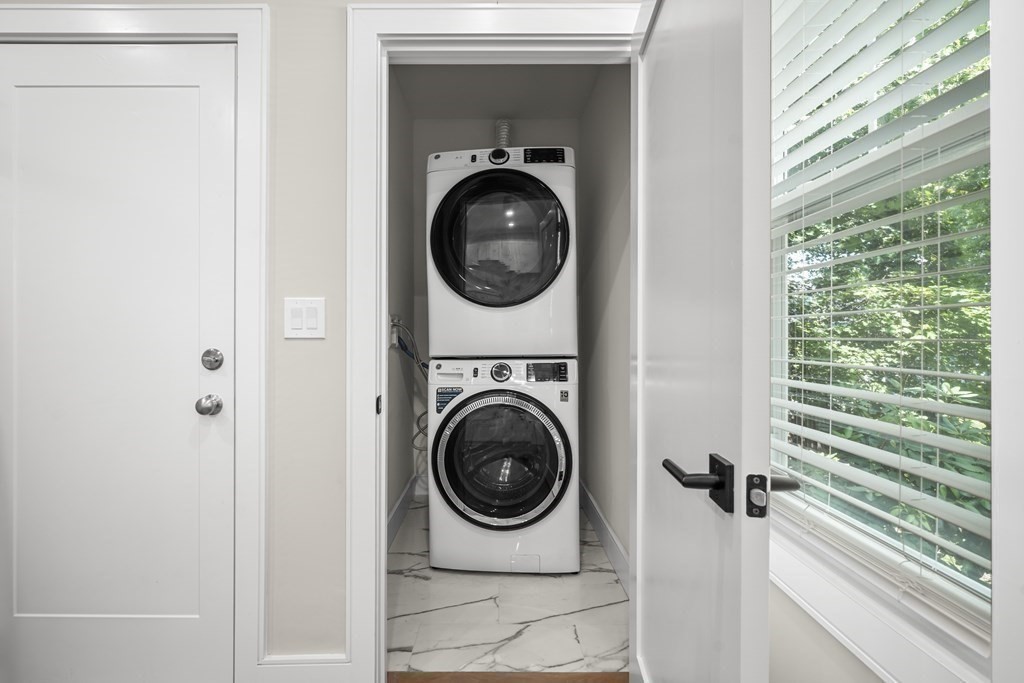 44 Iffley Road Boston, MA 02130 - Photo 11 of 19 a utility room with dryer and washer