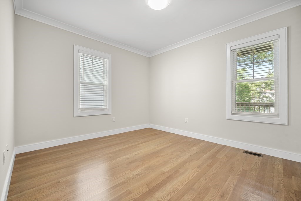 44 Iffley Road Boston, MA 02130 - Photo 15 of 19 an empty room with windows