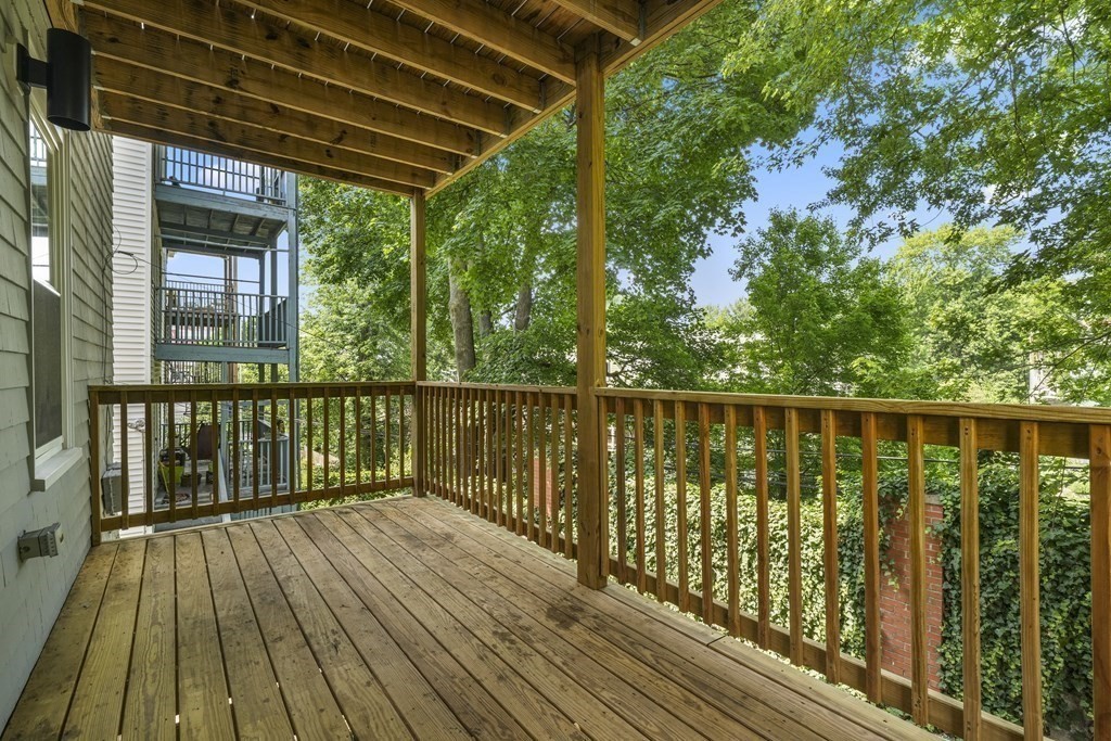 44 Iffley Road Boston, MA 02130 - Photo 19 of 19 a balcony with wooden floor and outdoor space