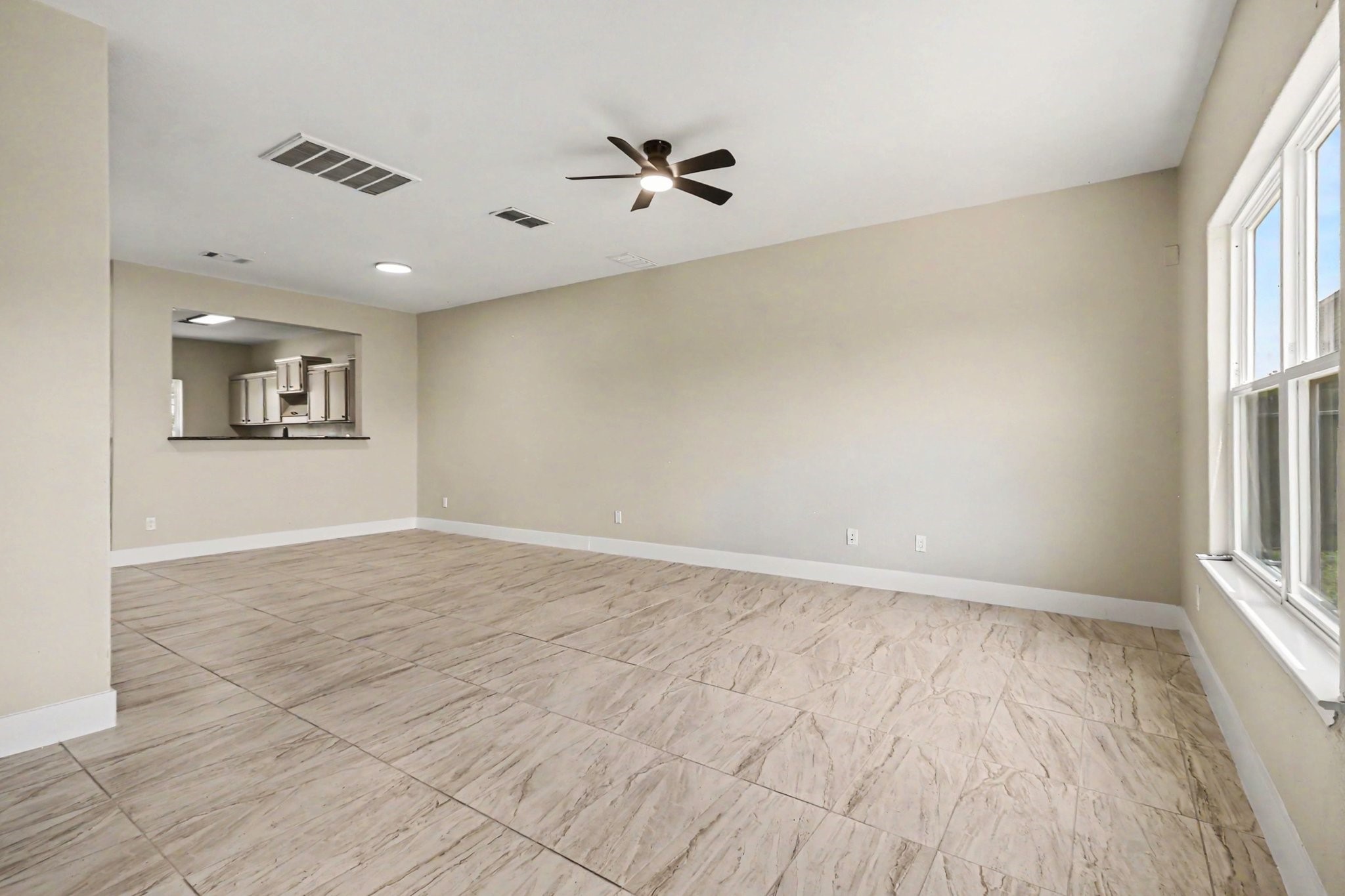 1322 Diamond Drape Drive Rosharon, TX 77583 - Photo 7 of 45 wooden floor in an empty room with a window