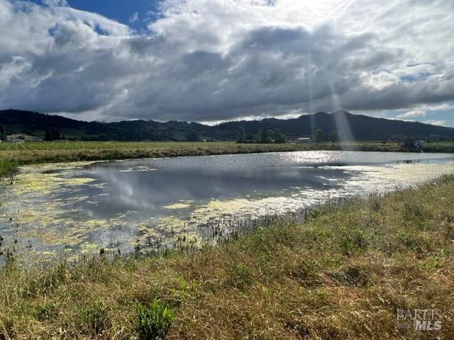1695 Geysers Road Geyserville, CA 95441 - Photo 22 of 23 a view of a lake in between of the house