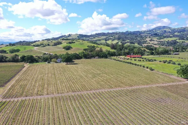 a view of a lake with mountain in the background