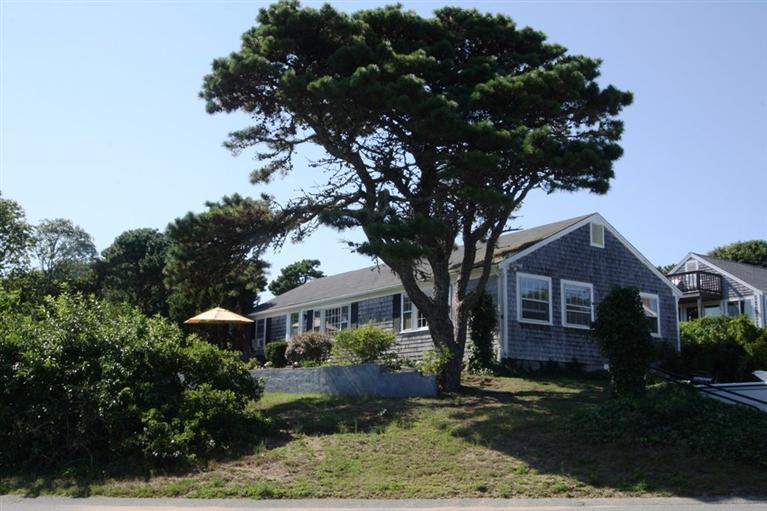 294 Bay View Road South Chatham, MA 02659 - Photo 3 of 34 a front view of a house with a garden