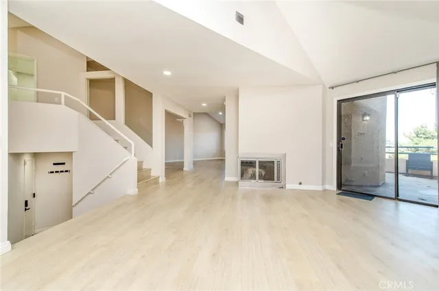 a view of a hallway with staircase