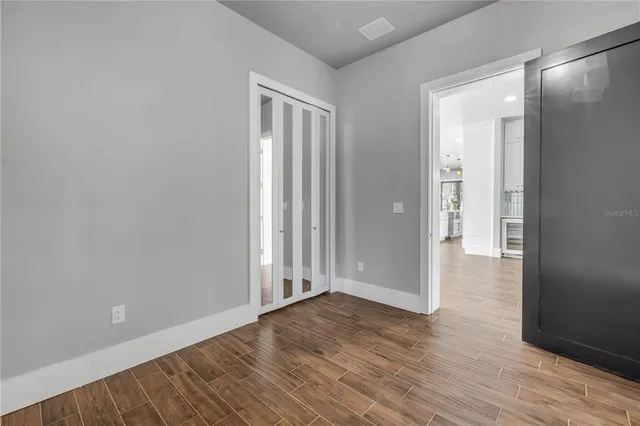 a swimming pool with outdoor seating and yard