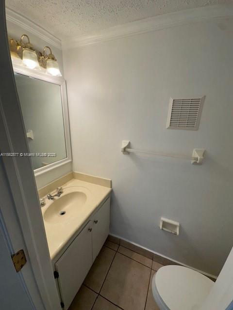 8600 Southwest 109th Avenue, Unit 4216 Miami, FL 33173 - Photo 14 of 20 a bathroom with a granite countertop sink a toilet and mirror
