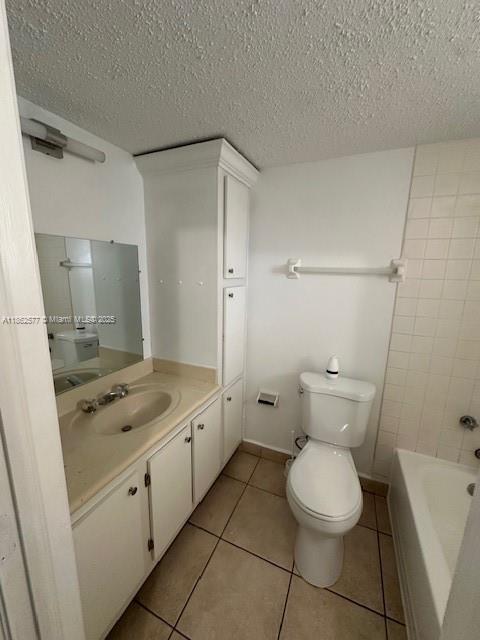8600 Southwest 109th Avenue, Unit 4216 Miami, FL 33173 - Photo 17 of 20 a bathroom with a granite countertop toilet and a sink