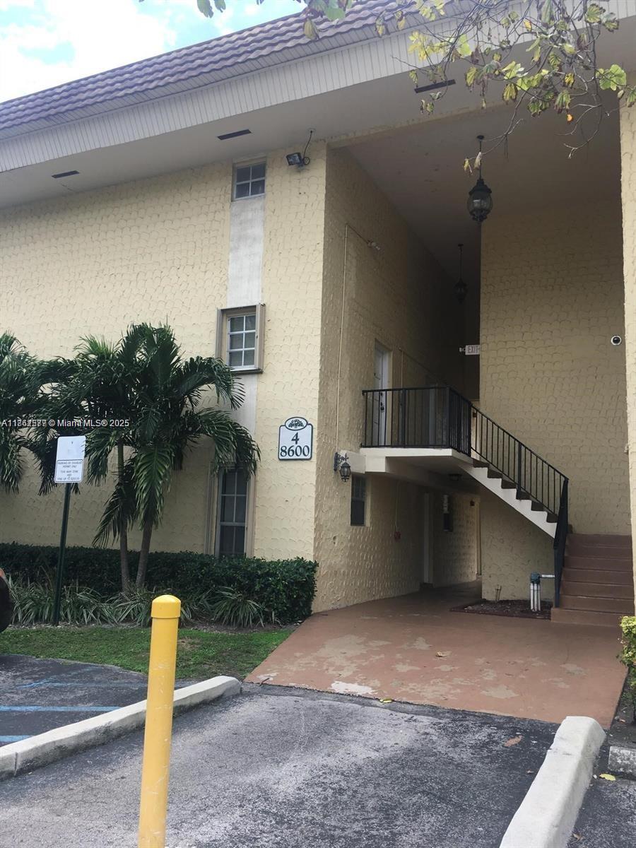 8600 Southwest 109th Avenue, Unit 4216 Miami, FL 33173 - Photo 2 of 20 a house view with a street