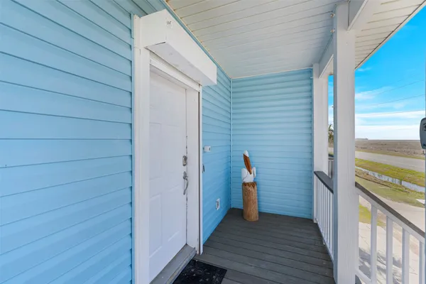a view of a yard and ocean view