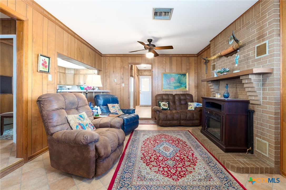 1003 North Ridge Street Lampasas, TX 76550 - Photo 6 of 44 a living room with furniture and a rug