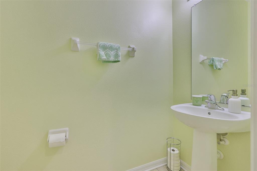 1516 Yale Castle Court Ruskin, FL 33570 - Photo 25 of 52 a bathroom with a sink and a mirror