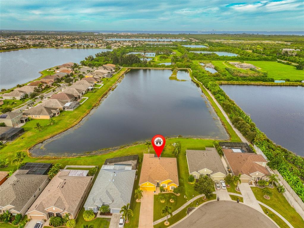 1516 Yale Castle Court Ruskin, FL 33570 - Photo 3 of 52 an aerial view of a city