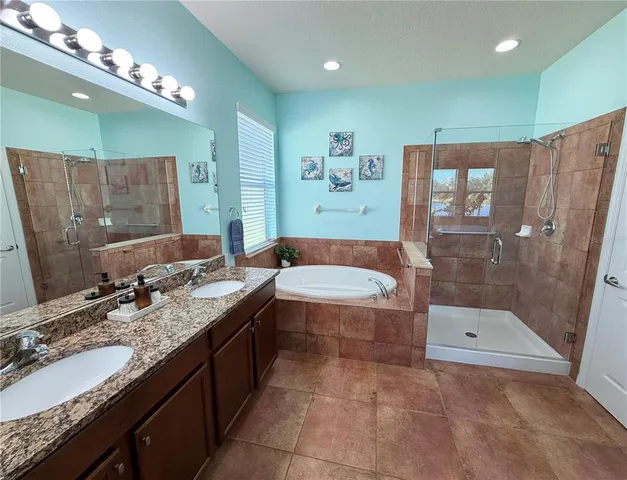 a living room with furniture and a shower