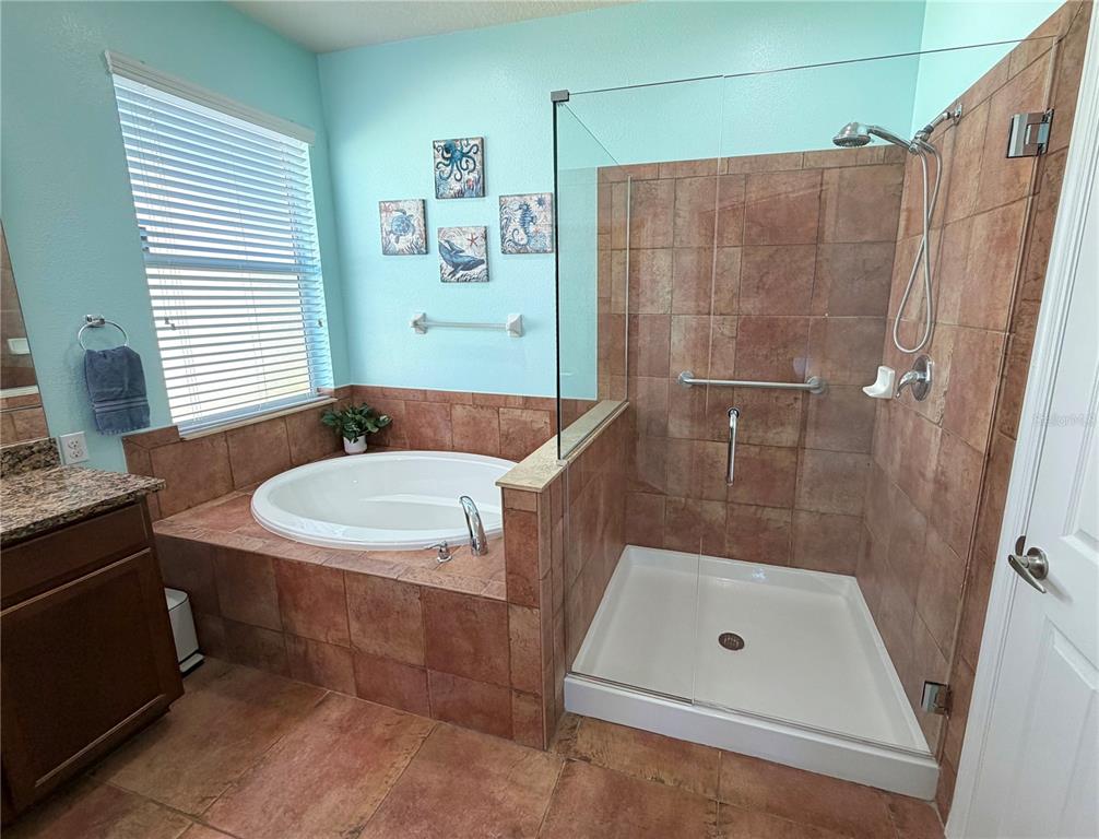 1516 Yale Castle Court Ruskin, FL 33570 - Photo 32 of 52 a bathroom with a sink a toilet and shower