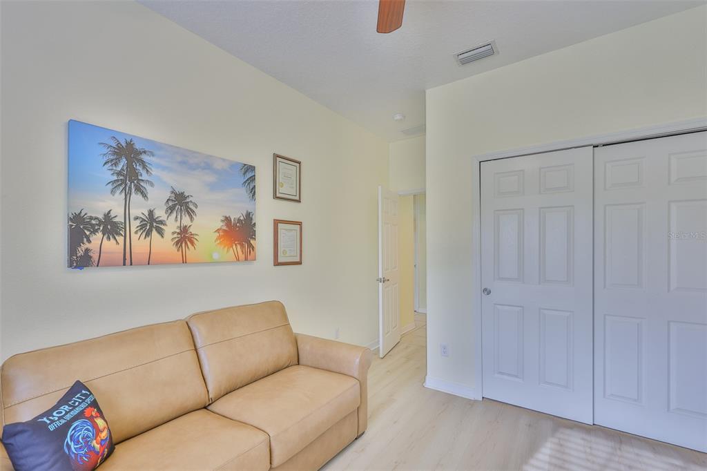 1516 Yale Castle Court Ruskin, FL 33570 - Photo 33 of 52 a living room with furniture and a shower