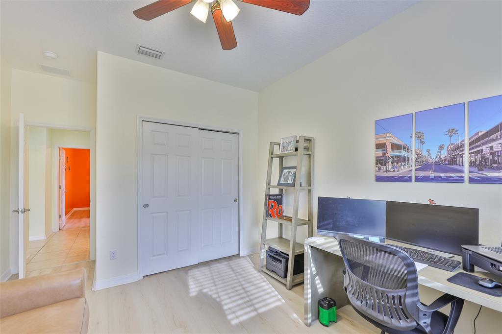 1516 Yale Castle Court Ruskin, FL 33570 - Photo 35 of 52 a view of a workspace with furniture and a window