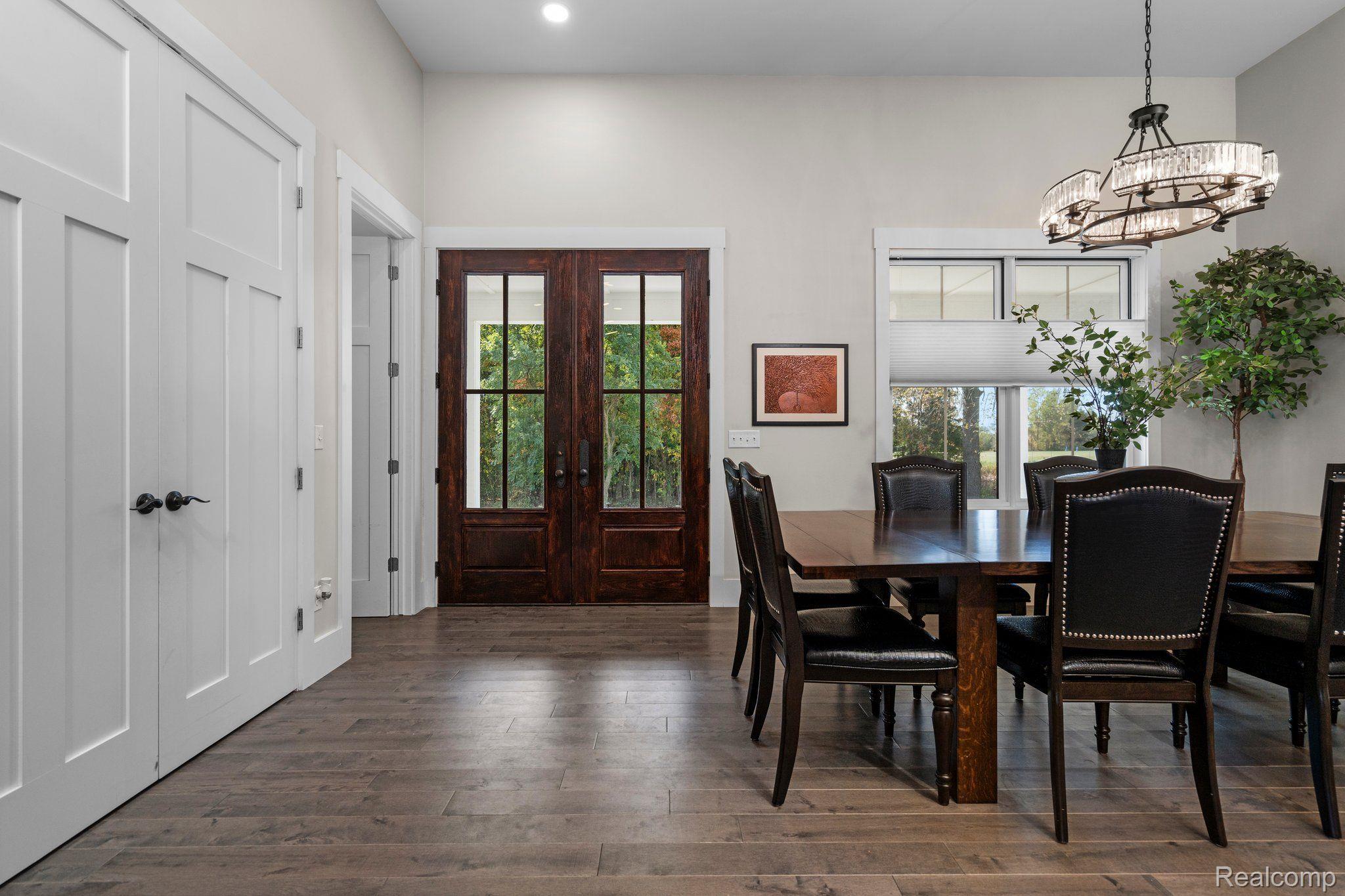 5057 Pardee Road East Webberville, MI 48892 - Photo 5 of 78 Enter the double doors into a spacious Great Room