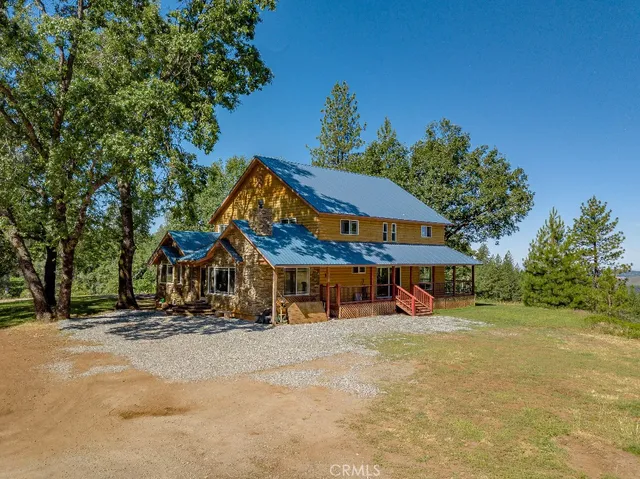 a view of a street with palm trees