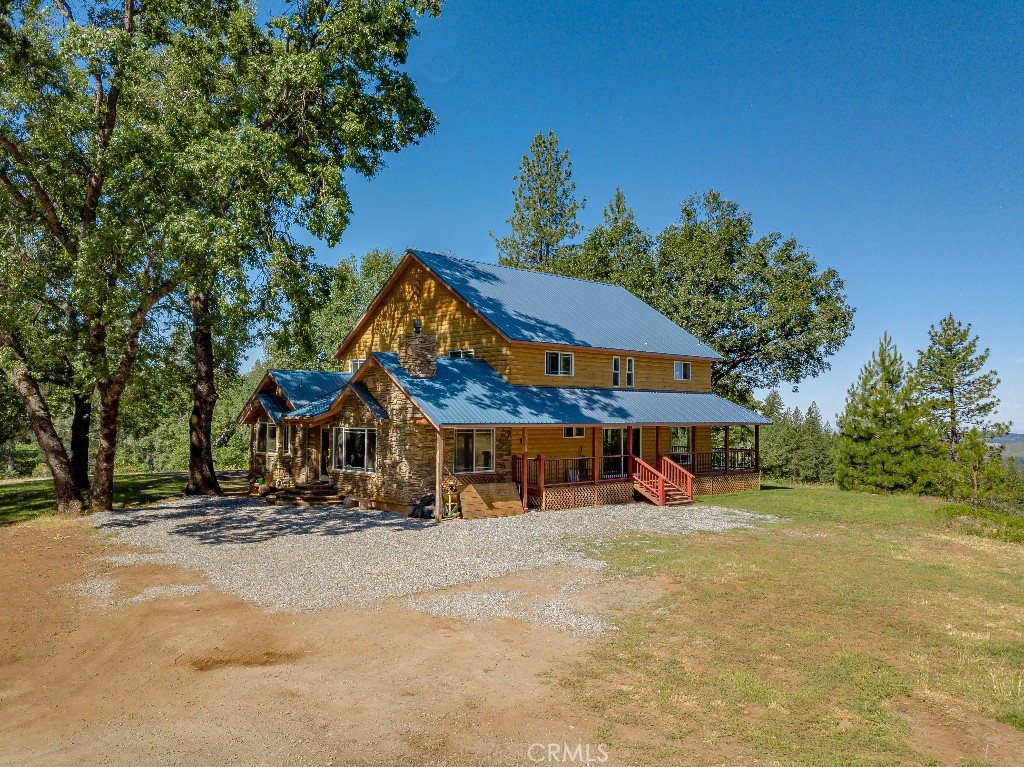 a view of a street with palm trees