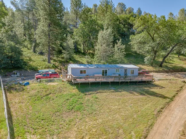 a view of swimming pool with a yard