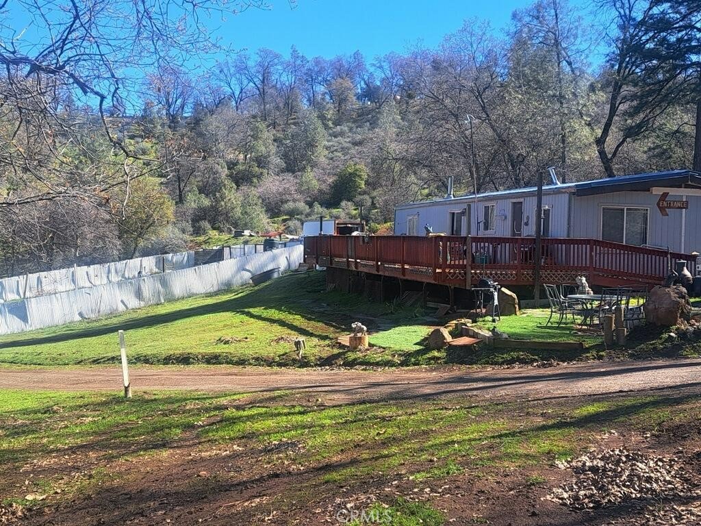 777 Morning Glory Road Mountain Ranch, CA 95246 - Photo 33 of 34 a view of a backyard with swimming pool