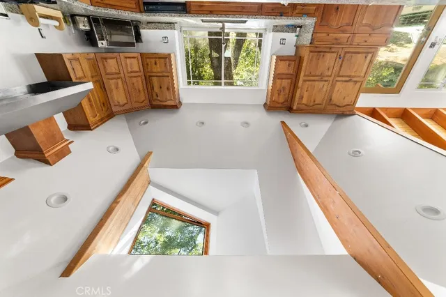 view of living room with furniture and a window