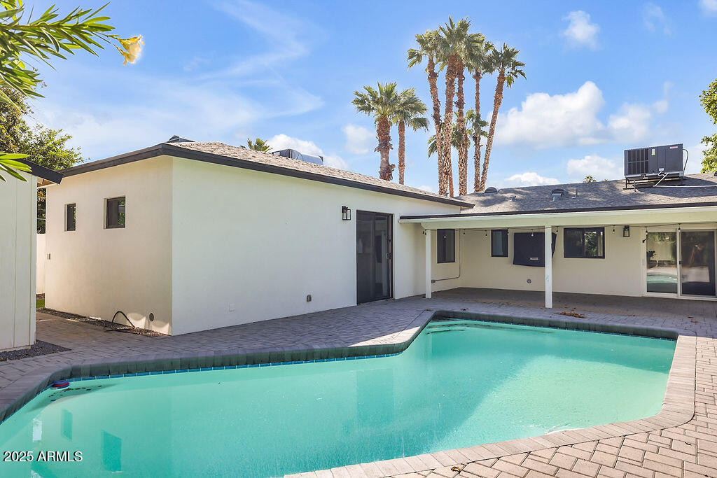 4102 East Pinchot Avenue Phoenix, AZ 85018 - Photo 25 of 28 a front view of a house with a yard