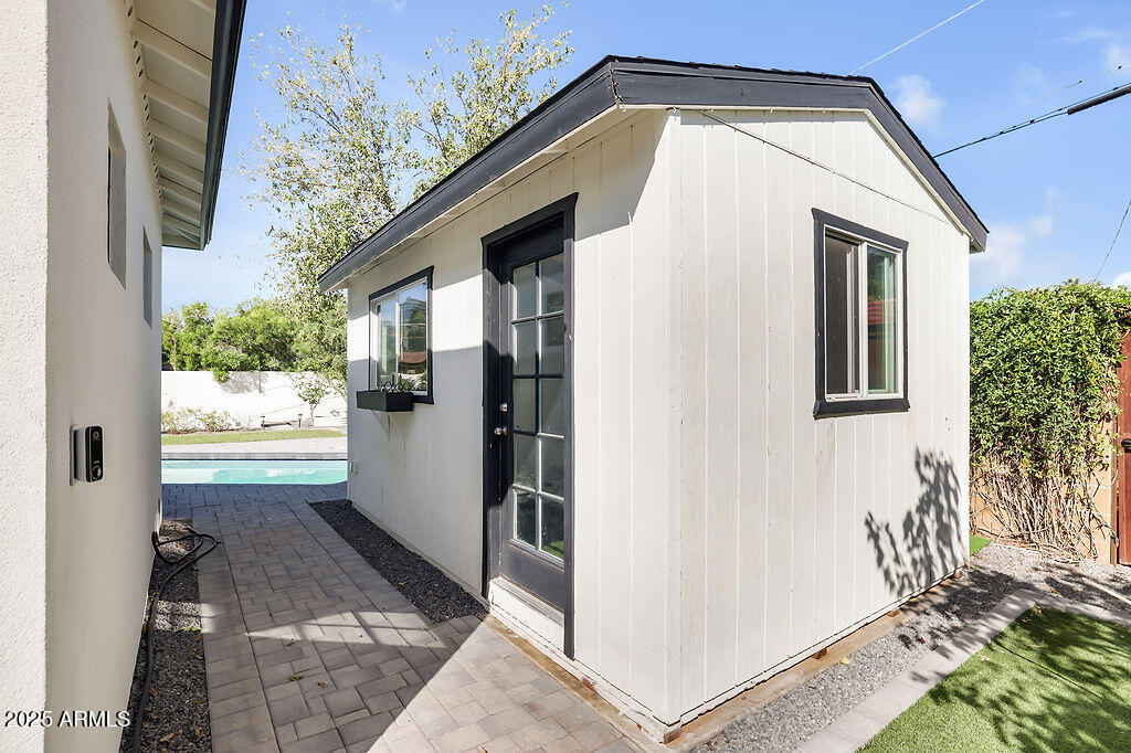 4102 East Pinchot Avenue Phoenix, AZ 85018 - Photo 26 of 28 a view of a house with a hallway