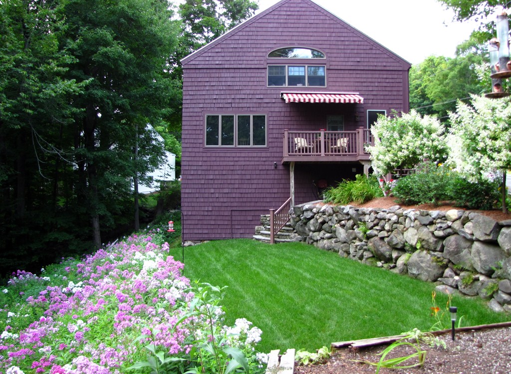 129 Gleason Road Princeton, MA 01541 - Photo 1 of 30 a front view of a house with a yard