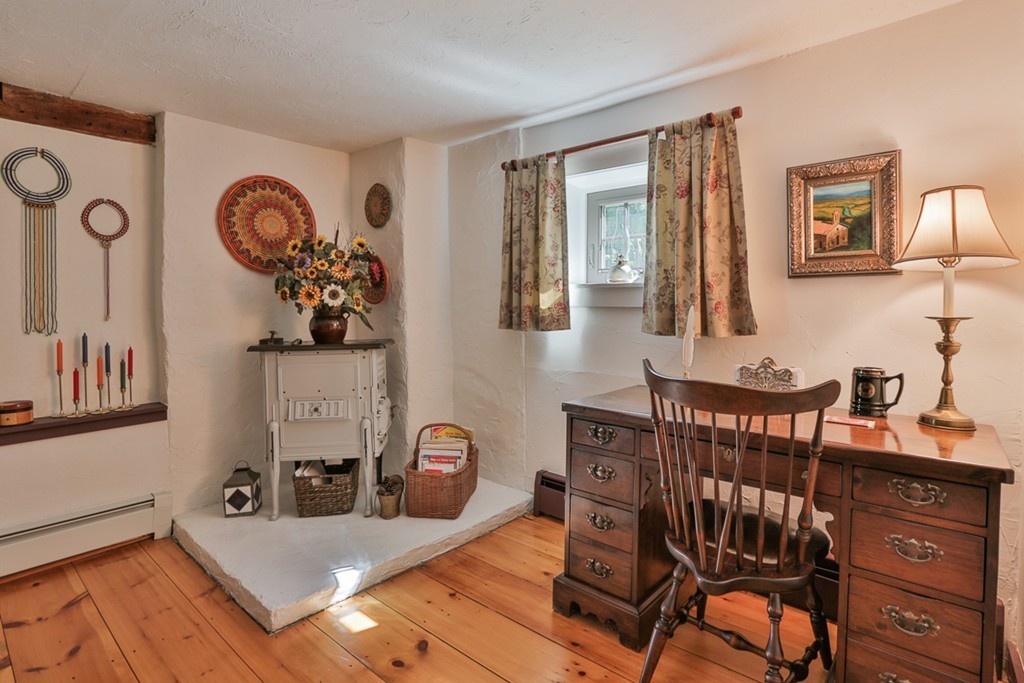 129 Gleason Road Princeton, MA 01541 - Photo 11 of 30 a view of a dining room with furniture and chandelier