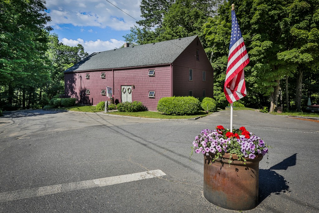 129 Gleason Road Princeton, MA 01541 - Photo 2 of 30 a front view of a house with a yard and potted plants