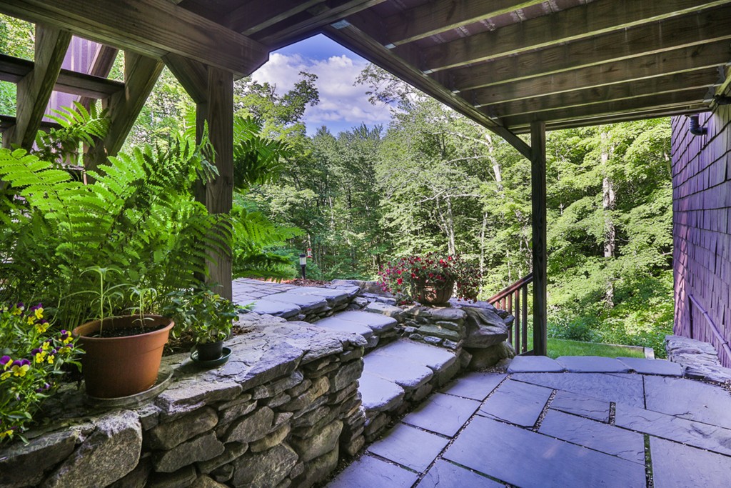 129 Gleason Road Princeton, MA 01541 - Photo 4 of 30 a view of a porch with furniture and next to a yard