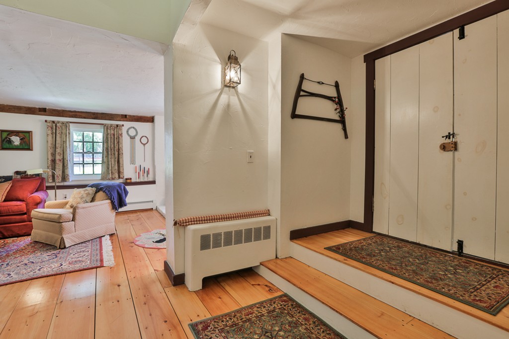 129 Gleason Road Princeton, MA 01541 - Photo 8 of 30 a living room with furniture and wooden floor