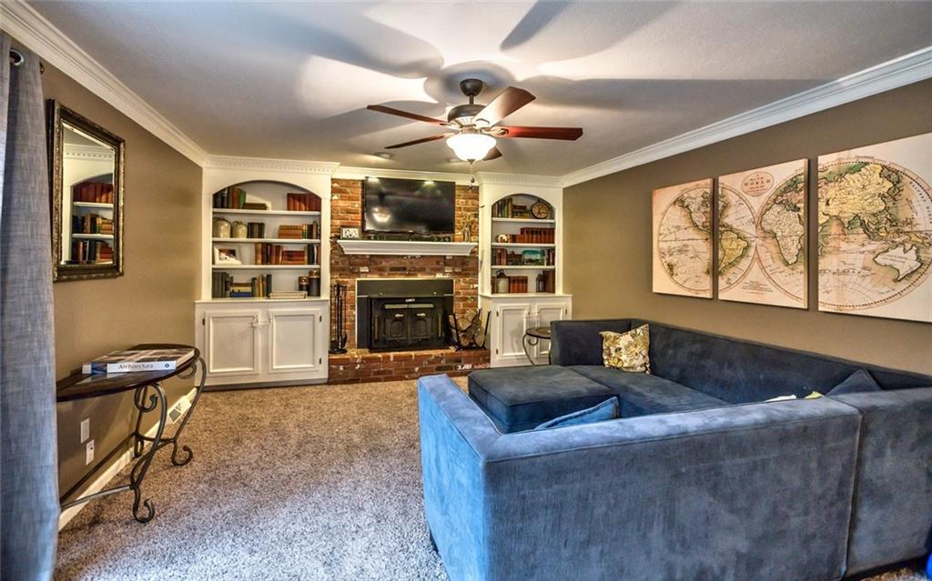 745 Spang Road Baden, PA 15005 - Photo 13 of 25 Family Room, Fireplace and Built In Bookcases