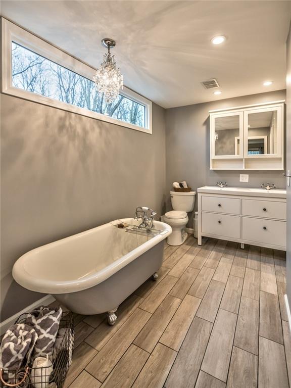 745 Spang Road Baden, PA 15005 - Photo 16 of 25 Cast Iron Bathtub, Ceramic Tile Floors, Crystal Chandelier