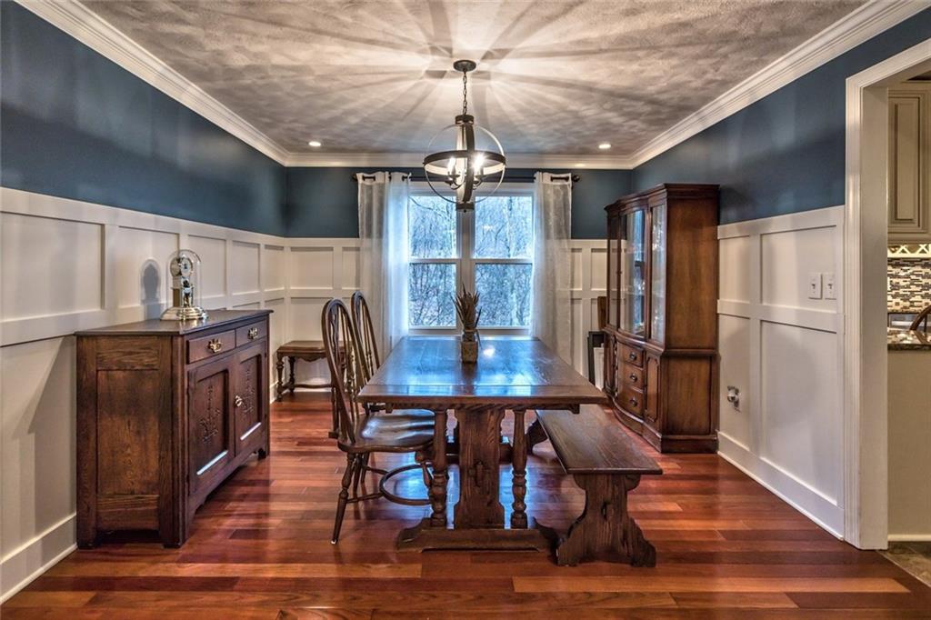 745 Spang Road Baden, PA 15005 - Photo 3 of 25 Dining Room - Brazilian Cherry Hardwood Floors, Wainscoting, New Lighting