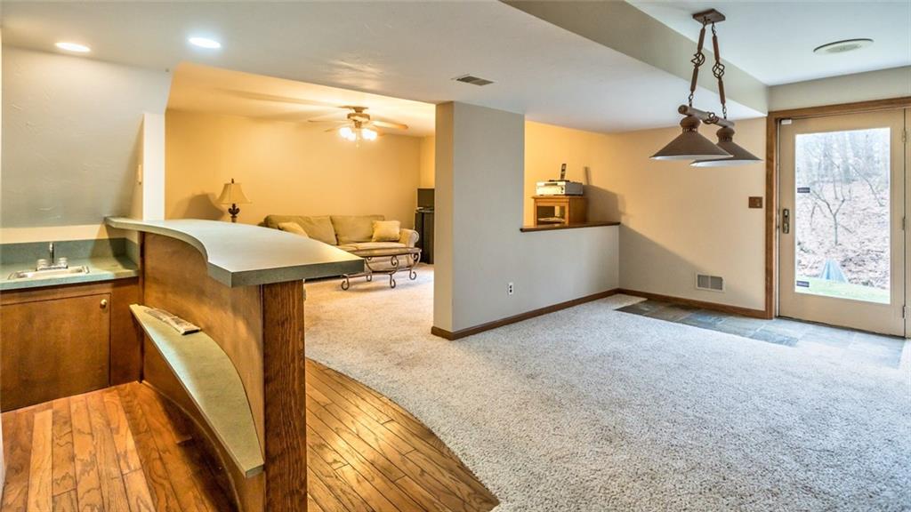 745 Spang Road Baden, PA 15005 - Photo 23 of 25 Room For Pool Table, Walk Out To Wooded Backyard