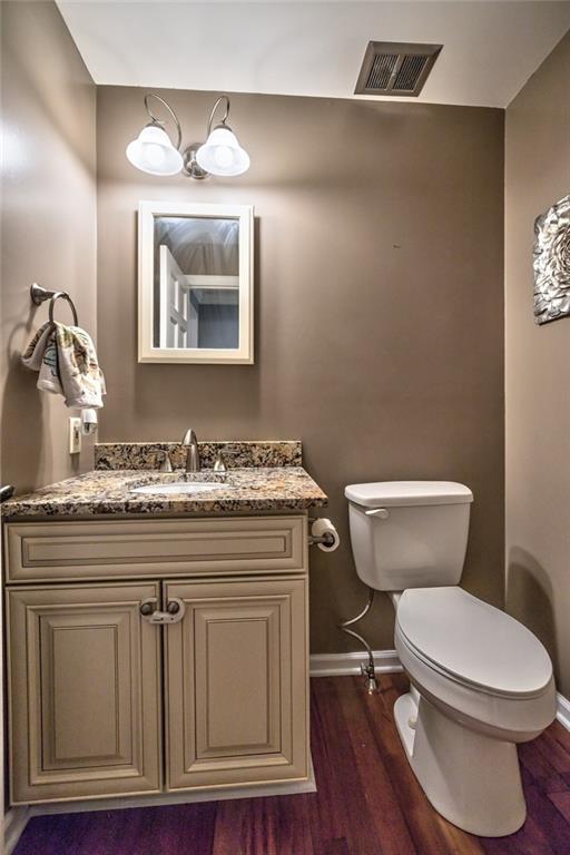 745 Spang Road Baden, PA 15005 - Photo 10 of 25 Updated Powder Room - Brazilian Cherry Hardwood, New Cabinet