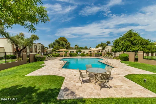 a garden view with a seating space