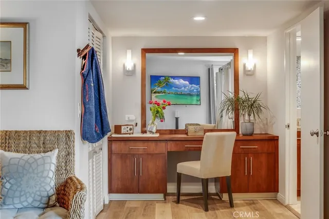 a spacious bathroom with a granite countertop tub sink and mirror