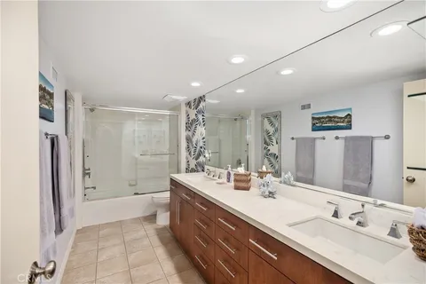 a view of a porch with furniture and floor to ceiling window