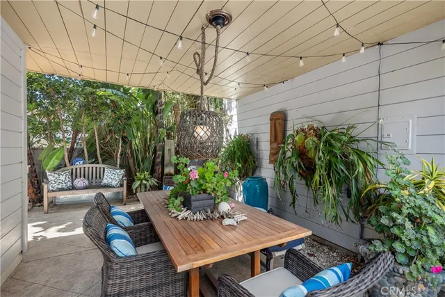 a view of a lake from balcony with seating space