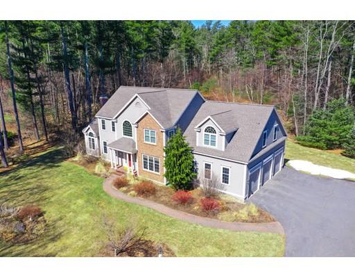271 Sargent Road Boxborough, MA 01719 - Photo 1 of 29 a view of a house with backyard and garden