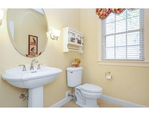 271 Sargent Road Boxborough, MA 01719 - Photo 15 of 29 a bathroom with a toilet sink and mirror
