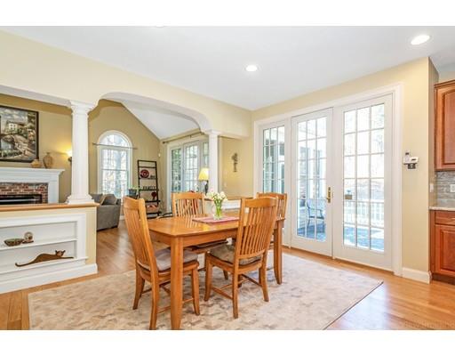 271 Sargent Road Boxborough, MA 01719 - Photo 8 of 29 a view of a dining room with furniture and wooden floor